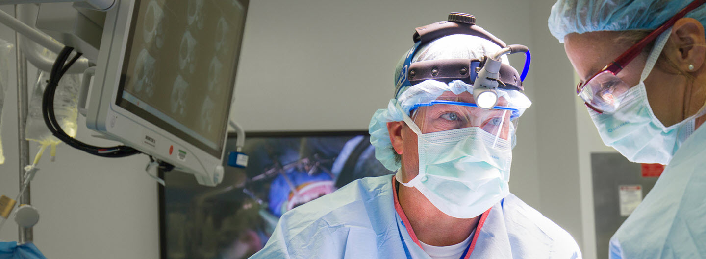 dr. clary and assistants in the operating room